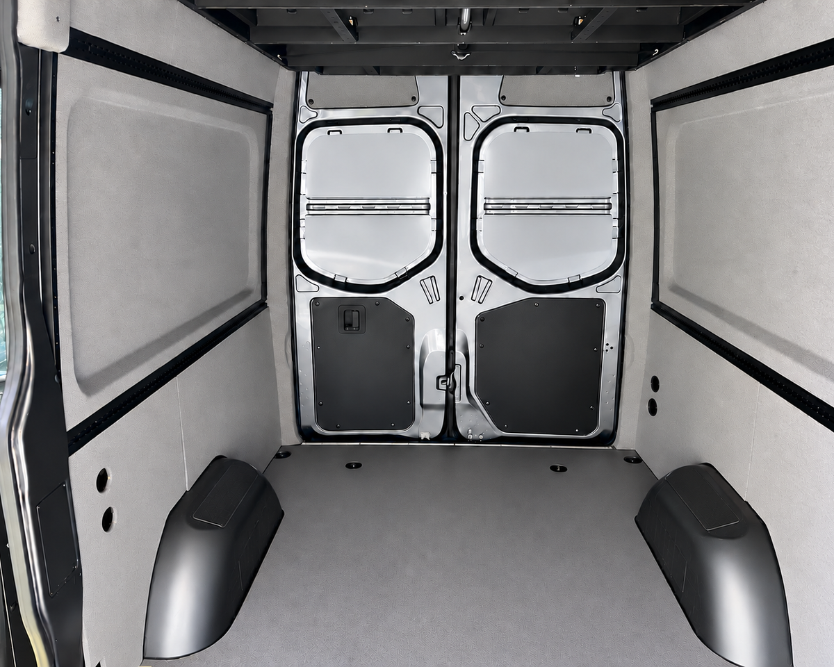 Finished Sprinter walls and wheel well area, view toward the rear doors