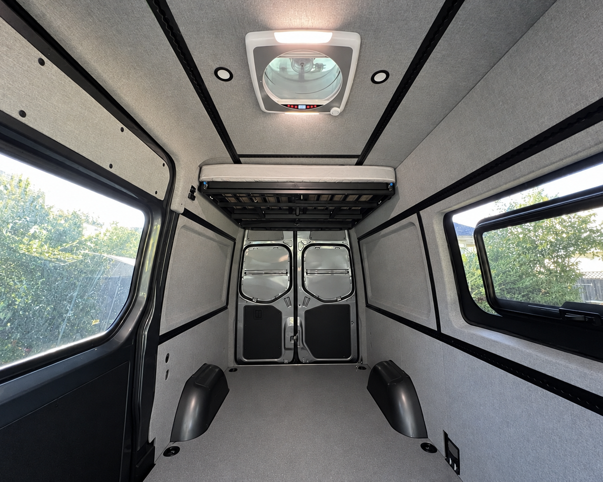 Sprinter interior conversion kit front to rear view with finished walls and ceiling