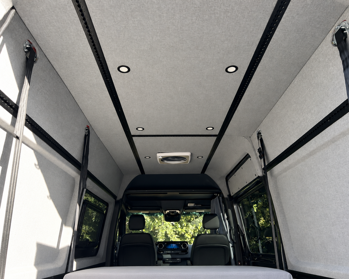 Sprinter ceiling panels with recessed lights, rear to front view