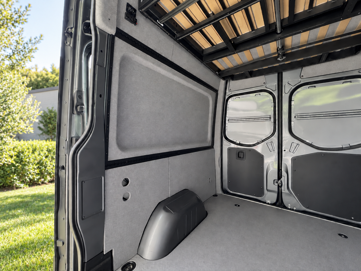 Sprinter interior conversion kit viewed from the sliding door toward the rear doors