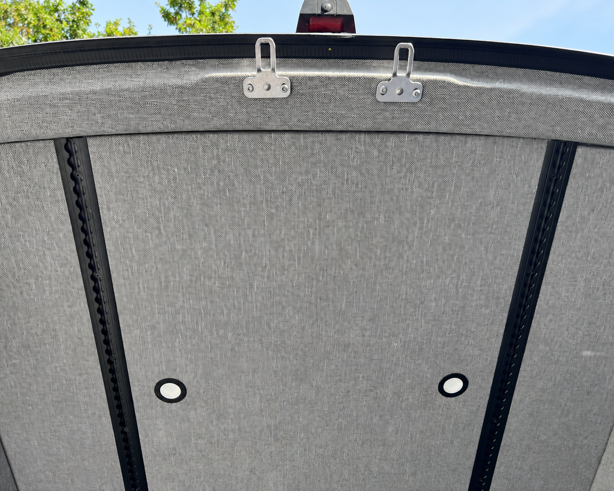 Close-up of pre-wrapped Sprinter ceiling panels and L-Track
