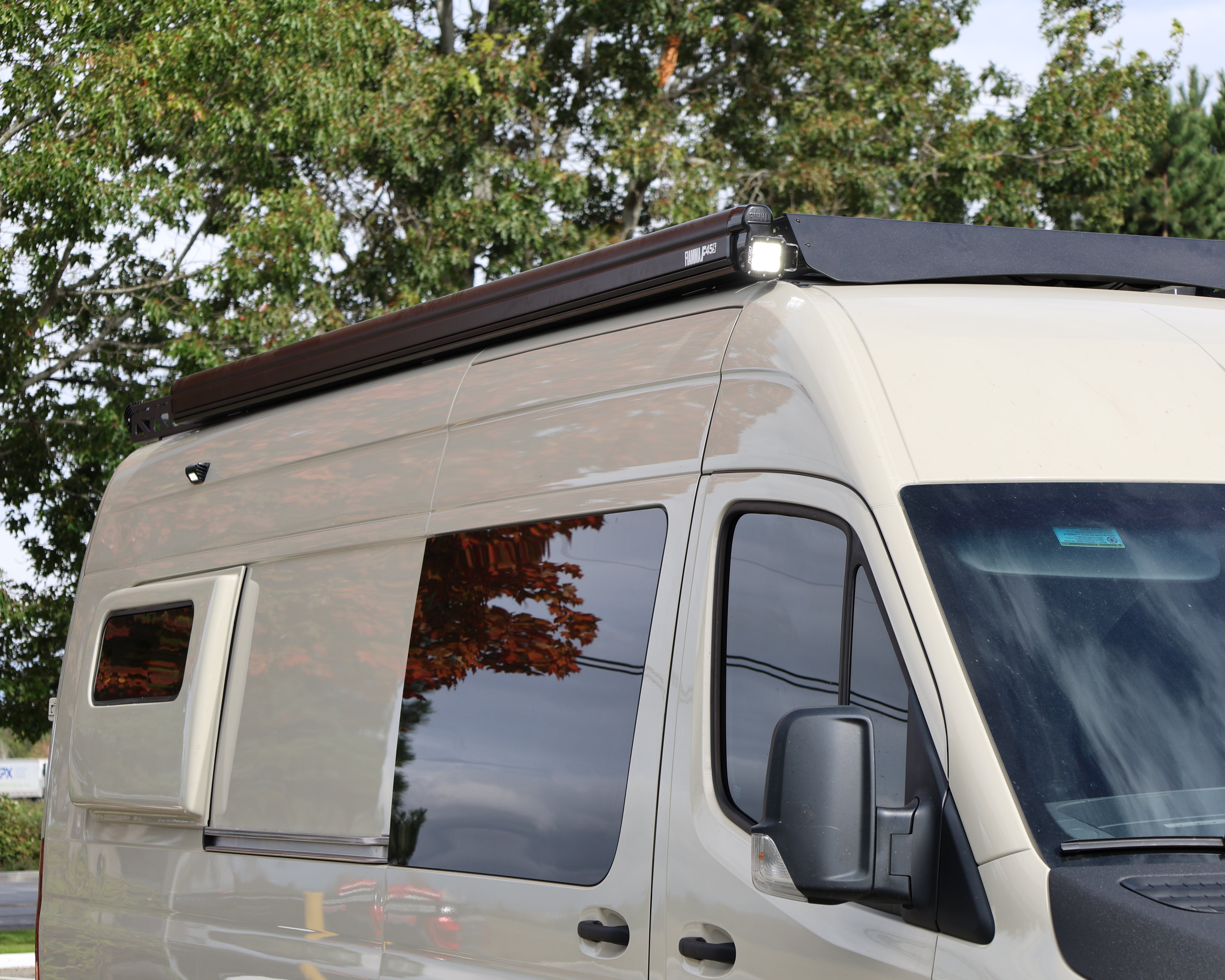 2007+ Mercedes Sprinter 144" High Roof Modular Roof Rack Fitted Side View With Fiammas Awning