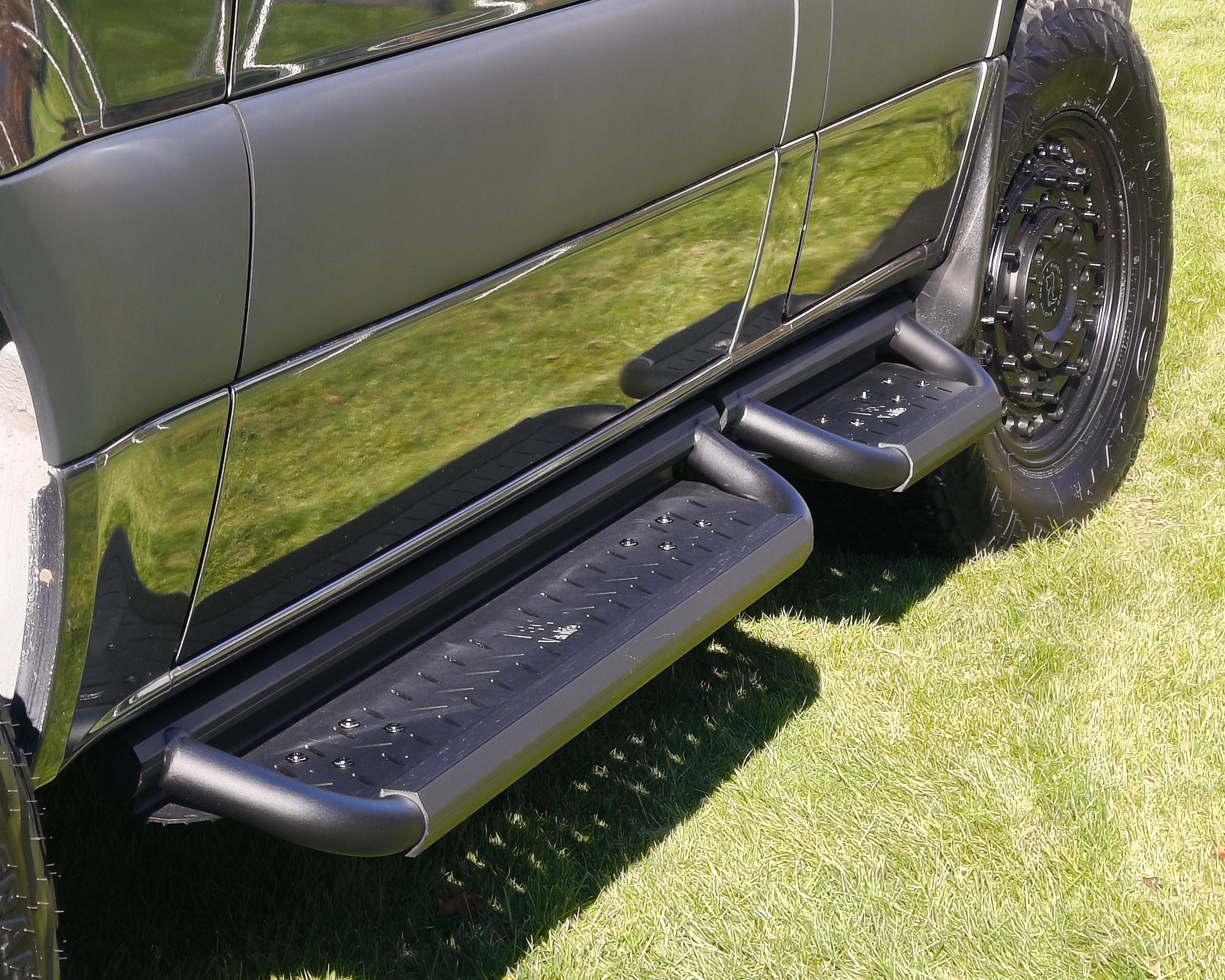Aluminum drop down running boards for Sprinter vans.