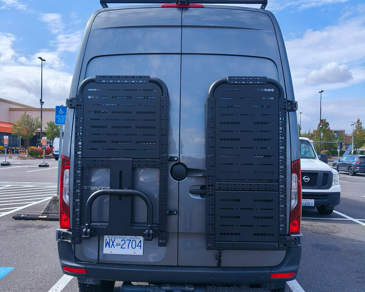 Driver side gear rack with top panel and tire carrier, paired with passenger side gear rack