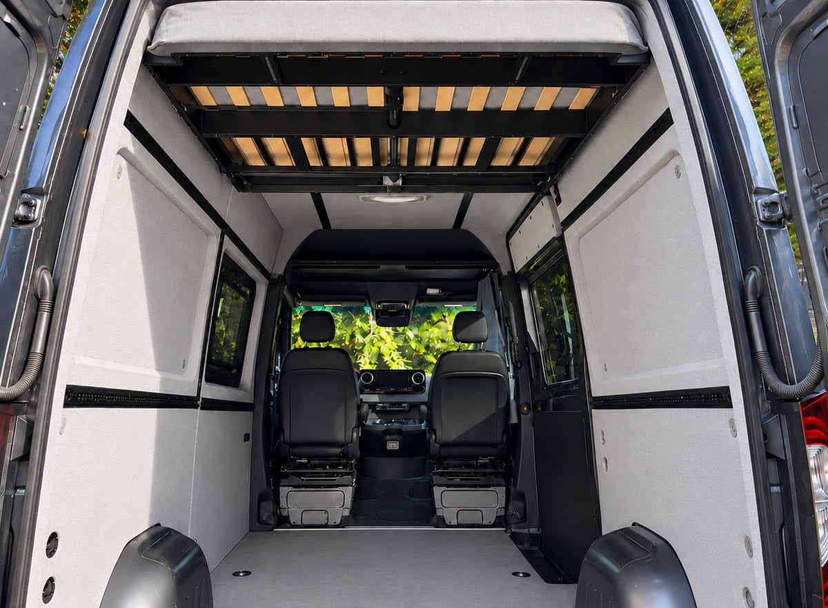 Sprinter interior conversion kit installed, rear to front view of finished walls and ceiling