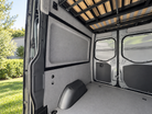 Sprinter interior conversion kit viewed from the sliding door toward the rear doors