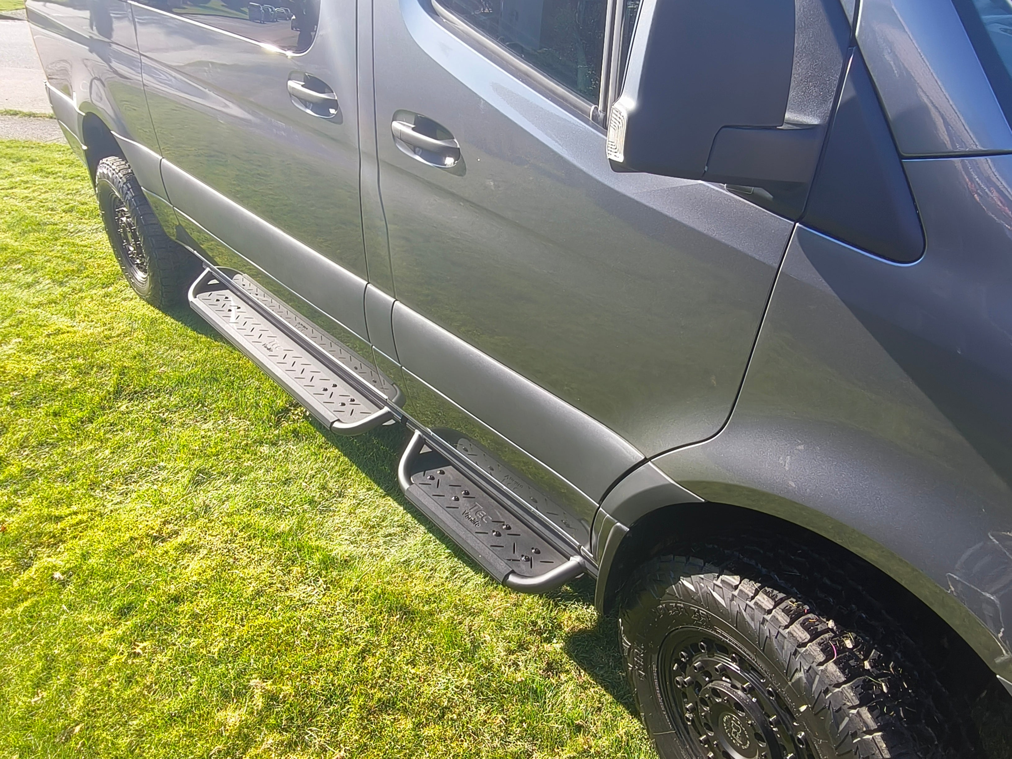 Coated aluminum modular drop down running boards for Sprinter vans.