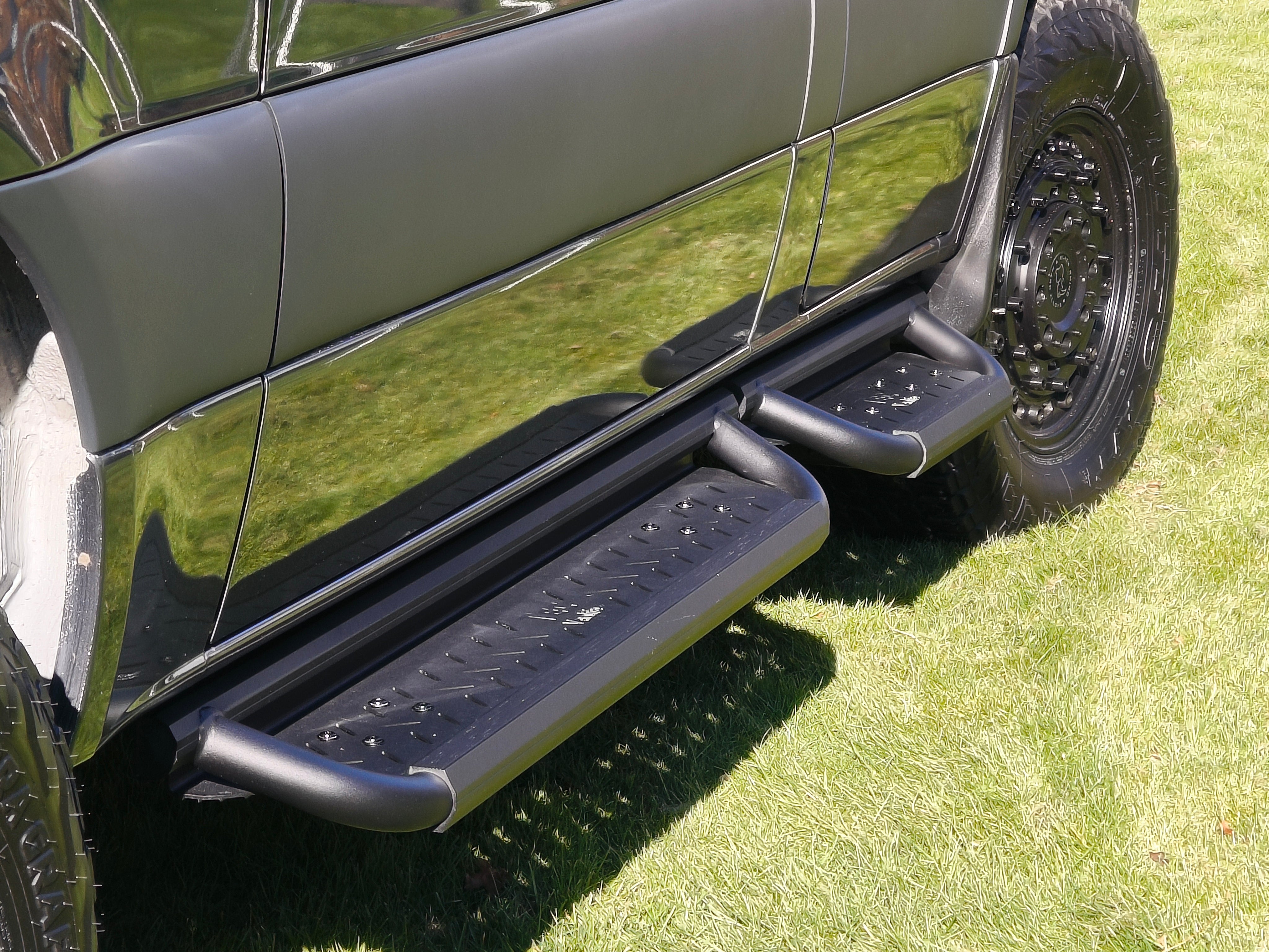 Aluminum drop down running boards for Sprinter vans.