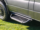 Modular drop down running boards for Sprinter vans with ribbed anti-slip footbed.